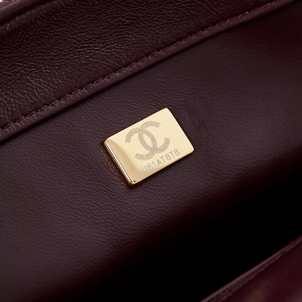 Ch*el flap bag with top handle